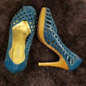 Teal peep toe pumps